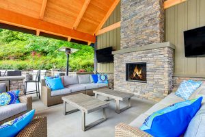 An Outdoor Stone Fireplace Will Light Up Your Summer